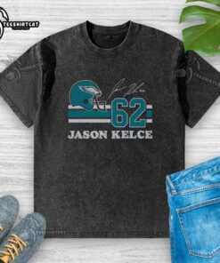 Alt Text: Original Eagles Jason Kelce signature jersey washed t-shirt featuring vibrant team colors and player details.