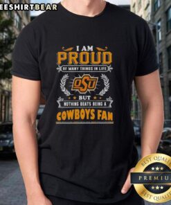 Alt Text: Oklahoma State Cowboys fan wearing a t-shirt that says 'I Am Proud Of Many Things In Life But Nothing Beats Being A Cowboys Fan'