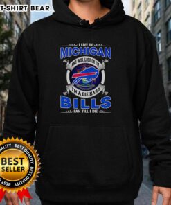 Buffalo Bills fan wearing a hoodie that says 'Win, Lose, or Tie, I'm a Dead Hard Buffalo Bills Fan Till I Die' in Michigan.