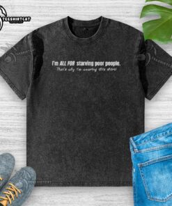 Person wearing a washed t-shirt with a message supporting starving poor people, promoting awareness and compassion.