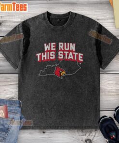 Alt Text: Original Louisville Basketball We Run This State washed t-shirt featuring bold graphics and a stylish design.
