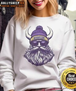 Alt Text: Original Minnesota Vikings mascot in a beanie and sunglasses, wearing a sweatshirt, showcasing team spirit.