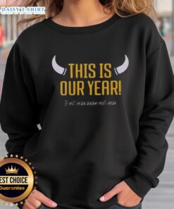 Original Minnesota Vikings sweatshirt with 'This is Our Year' slogan, perfect for fans celebrating the team's spirit.