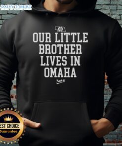 Alt Text: Original Nebraska Rivalry hoodie featuring 'Our Little Brother Lives in Omaha' design for fans.