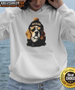 Original New Orleans Saints mascot wearing a beanie and sunglasses, showcasing team spirit in a stylish hoodie.
