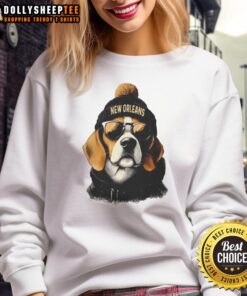 Original New Orleans Saints mascot in a beanie and sunglasses, wearing a stylish sweatshirt, showcasing team spirit.