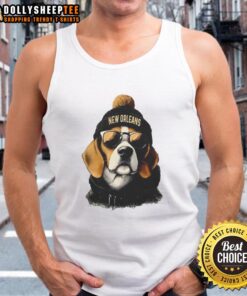 Original New Orleans Saints mascot in a beanie and sunglasses, wearing a tank top, showcasing team spirit.