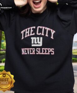 Original New York Giants Nike sweatshirt featuring 'The City Never Sleeps' design in vibrant colors.