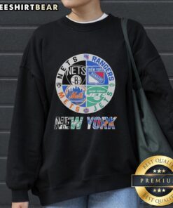 Original New York Jets, Nets, Mets, and Rangers mashup logo sweatshirt featuring iconic team logos.