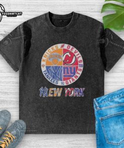 Alt Text: Original New York Knicks Yankees Giants Devils mashup logo on a washed t-shirt for sports fans.