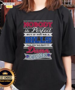 Alt Text: Original 'Nobody Is Perfect' Buffalo Bills fan ladies tee showcasing team spirit and humor in stylish design.
