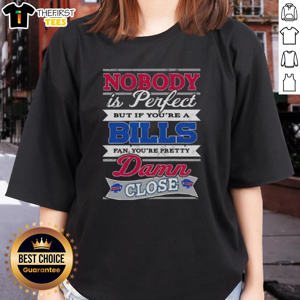 original-nobody-is-perfect-but-if-youre-a-buffalo-bills-fan-youre-pretty-damn-close-ladies-tee Alt Text: Original 'Nobody Is Perfect' Buffalo Bills fan ladies tee showcasing team spirit and humor in stylish design.