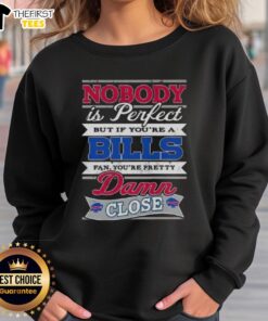 Alt Text: Original 'Nobody Is Perfect But If You're A Buffalo Bills Fan You're Pretty Damn Close' sweatshirt design.