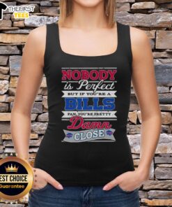 Buffalo Bills fan wearing a 'Nobody Is Perfect But If You're A Buffalo Bills Fan You're Pretty Damn Close' tank top.
