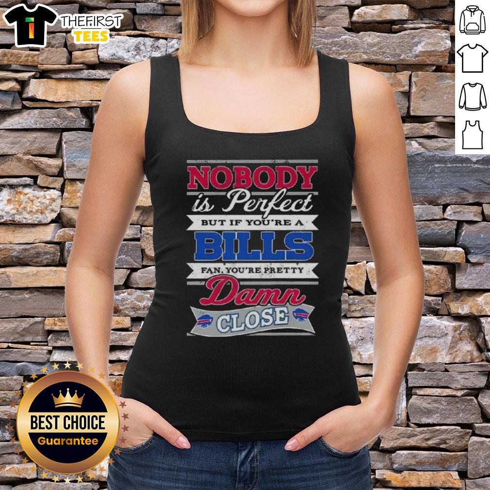 original-nobody-is-perfect-but-if-youre-a-buffalo-bills-fan-youre-pretty-damn-close-tank-top Buffalo Bills fan wearing a 'Nobody Is Perfect But If You're A Buffalo Bills Fan You're Pretty Damn Close' tank top.
