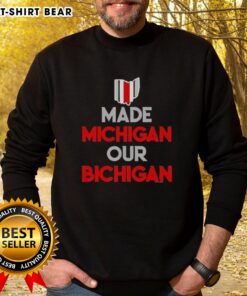 Ohio Buckeyes sweatshirt featuring 'Made Michigan Our Bichigan' quote, perfect for fans and casual wear.