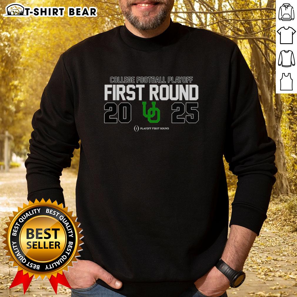 Original Oregon Ducks Ncaa 2025 College Football Playoff First Round Logo Sweatshirt Alt Text: Original Oregon Ducks NCAA 2025 College Football Playoff First Round logo sweatshirt in vibrant team colors.