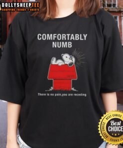 Original Peanuts Snoopy tee featuring 'Comfortably Numb' quote, perfect for fans of classic cartoon apparel.