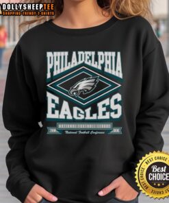 Original Philadelphia Eagles heater sweatshirt featuring team logo, perfect for fans to stay warm during games.