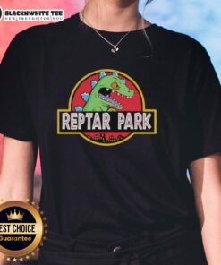 Original Reptar Park tee featuring Rugrats movie design, perfect for cartoon fans and stylish ladies.