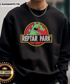 Alt Text: Original Reptar Park Rugrats Movie Cartoon sweatshirt featuring vibrant colors and iconic characters for fans.