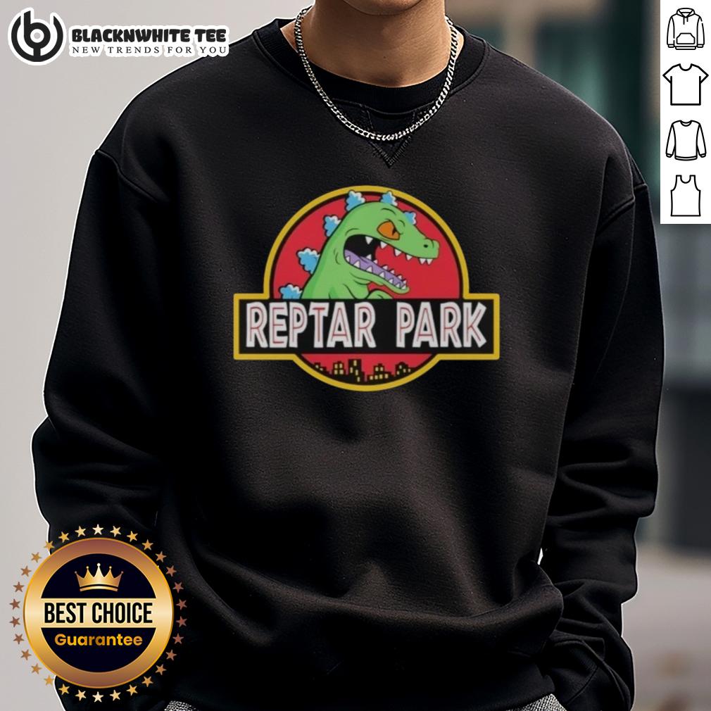 Original Reptar Park Rugrats Movie Cartoon Sweatshirt Alt Text: Original Reptar Park Rugrats Movie Cartoon sweatshirt featuring vibrant colors and iconic characters for fans.