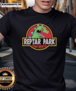 Original Reptar Park Rugrats Movie cartoon T-shirt featuring vibrant graphics of Reptar and classic Rugrats characters.