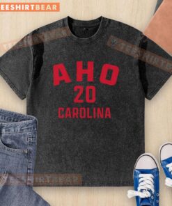 Original Sebastian Aho Carolina Hurricanes hockey washed t-shirt featuring team colors and logo.