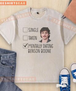 Alt Text: Original single 'Mentally Dating' by Benson Boone on a washed t-shirt, showcasing trendy music merchandise.