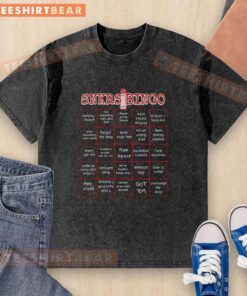 Alt Text: Original Snkrs Bingo Card design on a washed t-shirt, featuring humorous text about sneaker culture and losing.