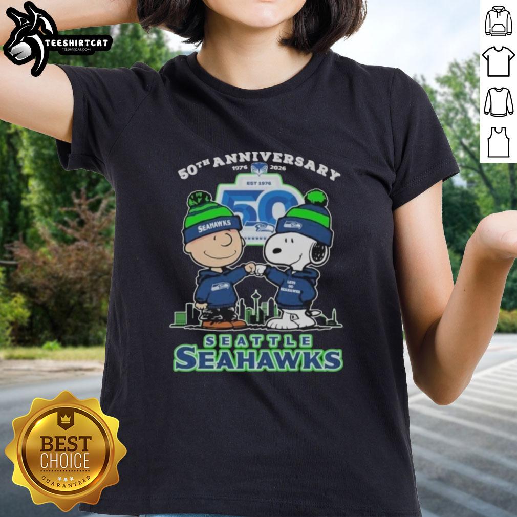 original-snoopy-and-charlie-brown-the-peanuts-seattle-seahawks-50th-anniversary-1976-2025-ladies-tee Alt Text: Original Snoopy and Charlie Brown Peanuts Seattle Seahawks 50th Anniversary Ladies Tee, 1976-2025 design.