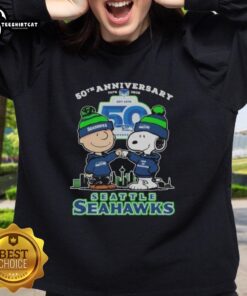 Original Snoopy and Charlie Brown Peanuts Seahawks 50th Anniversary sweatshirt featuring vibrant graphics and team colors.