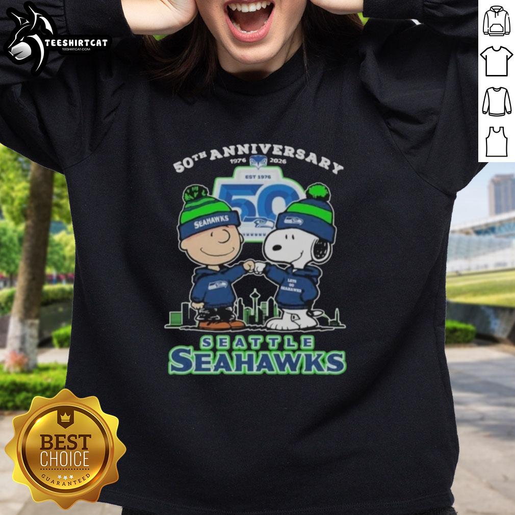 original-snoopy-and-charlie-brown-the-peanuts-seattle-seahawks-50th-anniversary-1976-2025-sweatshirt Original Snoopy and Charlie Brown Peanuts Seahawks 50th Anniversary sweatshirt featuring vibrant graphics and team colors.