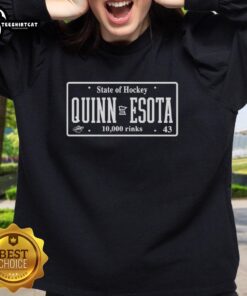 Original state of Hockey Quinn Esota sweatshirt featuring a classic design and vibrant colors, perfect for fans.