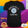 Original UNC Tar Heels Reniya Kelly basketball T-shirt featuring vibrant team colors and logo.