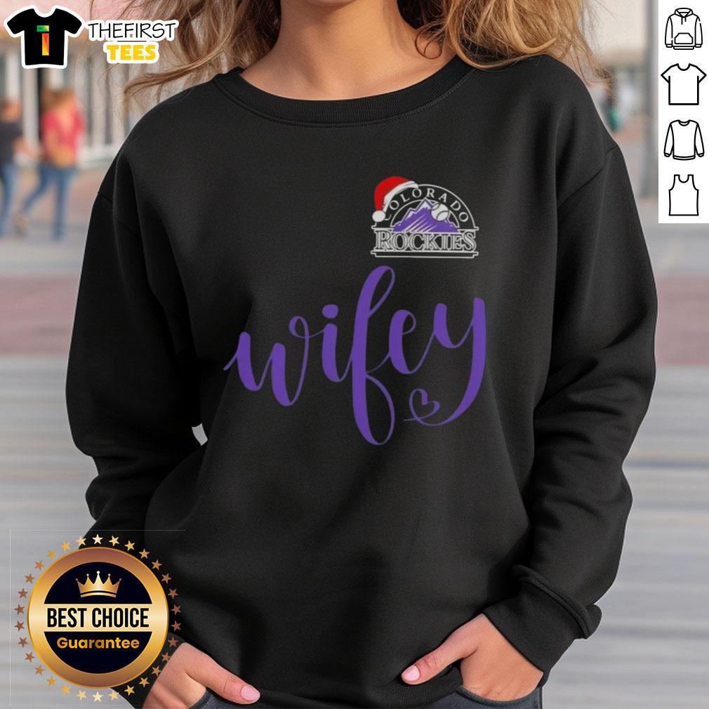 original-wifey-colorado-rockies-santa-hat-merry-christmas-sweatshirt Original Wifey Colorado Rockies sweatshirt with Santa hat for a festive Merry Christmas look.