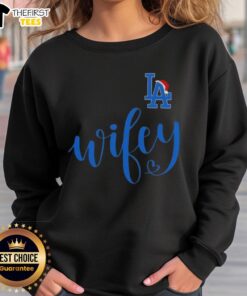 Original Wifey Los Angeles Dodgers Santa Hat Merry Christmas Sweatshirt in festive red with team logo and holiday design.