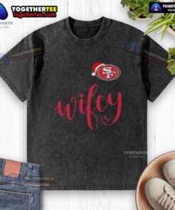 Alt Text: Original Wifey San Francisco 49ers Santa hat Merry Christmas washed t-shirt displayed on a festive background.