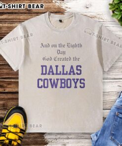 Premium washed t-shirt featuring 'On the Eighth Day God Created the Dallas Cowboys' graphic design.