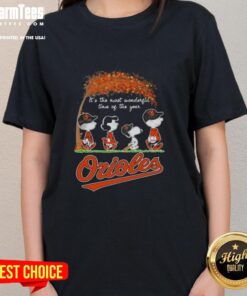 Alt Text: Premium Baltimore Orioles X Peanuts Snoopy and Friends autumn tee for women, celebrating the joy of the season.