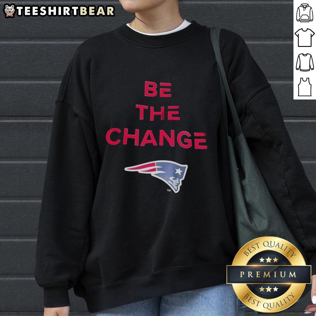 premium-be-the-change-new-england-patriots-sweatshirt Alt Text: Premium Be The Change New England Patriots sweatshirt featuring team colors and logo for ultimate fan style.