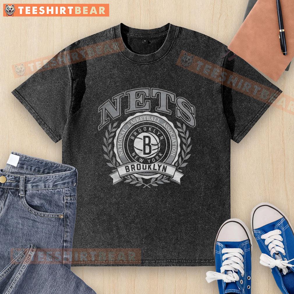 premium-brooklyn-nets-national-basketball-association-logo-laurel-wreath-frame-retro-washed-t-shirt Alt Text: Premium Brooklyn Nets NBA logo in a laurel wreath frame on a retro washed t-shirt design.