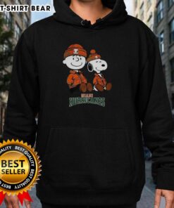 Premium Charlie Brown and Snoopy Miami Hurricanes hoodie featuring vibrant team colors and playful cartoon design.