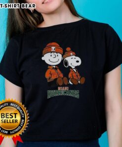 Alt Text: Premium Charlie Brown and Snoopy Miami Hurricanes ladies tee featuring vibrant colors and stylish design for fans.