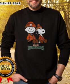 Premium Charlie Brown and Snoopy Miami Hurricanes sweatshirt featuring vibrant graphics and cozy design for fans.