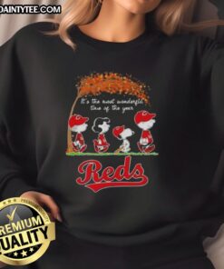 Alt Text: Premium Cincinnati Reds X Peanuts Snoopy and Friends sweatshirt celebrating autumn and the joy of the season.