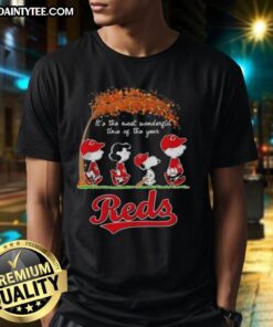 Alt Text: Premium Cincinnati Reds X Peanuts Snoopy and Friends autumn t-shirt celebrating It's The Most Wonderful Time Of The Year.