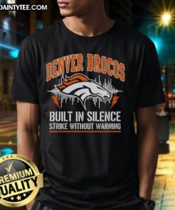 Premium Denver Broncos Built In Silence Strike Without Warning T-Shirt featuring bold team logo and stylish design.