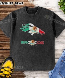 Alt Text: Premium Denver Broncos football t-shirt featuring a Mexican flag logo, perfect for fans and collectors.