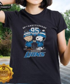 Alt Text: Premium Detroit Lions 95th Anniversary 2025 One Pride Tee featuring Charlie Brown and Snoopy for ladies.